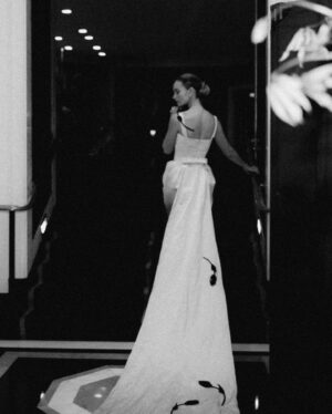 Lily James Instagram - My dream date in my absolute dream dress. @erdemlondon thank you so much for such a precious memory. I loved every moment of dreaming up this stunning gown with you and the @erdem team. The story and magic of this dress is truly breathtaking. You are a true artist and I feel so privileged to have worn
 your creation on this iconic carpet. @voguemagazine thank you for having me. 🖤
@rebeccacorbinmurray @valeriaferreiramakeup @halleybrisker @betina_goldstein @shilabeautycenter @skj @thebeautysandwich THANK YOU 💋
Thank you @iona.wolff for capturing these behind the scenes xx#