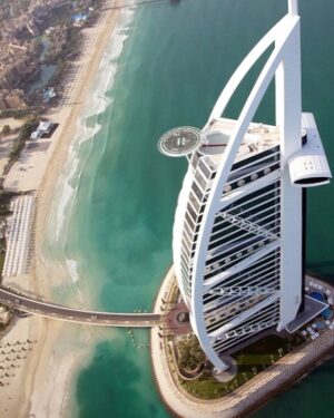 Lin Oeding Instagram - Quick stop at the Burj Al Arab. Learned today that it took 3000 companies, 250 designers, and 3500 workers on site daily to build this hotel. Starting in 1994, it took 2 years just to build the artificial island to support the weight, and another 3 years to build the hotel. Pretty crazy, huh?