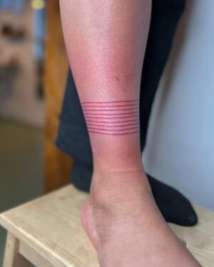 Lindsay Philomene Instagram - I worked on this very special collaboration with my mentor @phylotattoos this weekend. She’s an expert in straight-line work, so when I received this client’s request, I reached out (with the client’s consent of course) to see if she would give me some guidance. 

It ended up being a remarkable day of tattooing for all of us. We shared snacks, stories, Phylo shared some of her technical expertise with me, and we put our brains together for the trickiest parts (putting that stencil on, wowza!). Any artist will tell you that tattooing is a practice of life-long learning. In an era of social media influencers & tattoo celebrities who only show images of tattoo “perfection”, I think it’s important for us as artists to demonstrate that we are human: always learning, and that none of us do it alone. Also, in my own practice, I understand how vital the experience of being tattooed is for my clients, and I’m really grateful for the beautiful container that we were able to create together 🩵 

Thanks again to Melissa & Phylo, & I look forward to finishing up this weekend! 

Also the 4th slide is dedicated to all the body-workers who treat tattoo artists. Now you know why our bodies are so broken lol 😬
Done @catalpastudio 
.
.
.
.
.
.
.
.
.
.
.
.
#tattoocollaboration #montrealtattoo #melanintattoos #finelinework #phylotattoos #redink #redtattoo #queertattooer #queer #montrealtattooers #nonbinarytattooartist