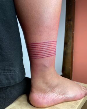 Lindsay Philomene Instagram - I worked on this very special collaboration with my mentor @phylotattoos this weekend. She’s an expert in straight-line work, so when I received this client’s request, I reached out (with the client’s consent of course) to see if she would give me some guidance. 

It ended up being a remarkable day of tattooing for all of us. We shared snacks, stories, Phylo shared some of her technical expertise with me, and we put our brains together for the trickiest parts (putting that stencil on, wowza!). Any artist will tell you that tattooing is a practice of life-long learning. In an era of social media influencers & tattoo celebrities who only show images of tattoo “perfection”, I think it’s important for us as artists to demonstrate that we are human: always learning, and that none of us do it alone. Also, in my own practice, I understand how vital the experience of being tattooed is for my clients, and I’m really grateful for the beautiful container that we were able to create together 🩵 

Thanks again to Melissa & Phylo, & I look forward to finishing up this weekend! 

Also the 4th slide is dedicated to all the body-workers who treat tattoo artists. Now you know why our bodies are so broken lol 😬
Done @catalpastudio 
.
.
.
.
.
.
.
.
.
.
.
.
#tattoocollaboration #montrealtattoo #melanintattoos #finelinework #phylotattoos #redink #redtattoo #queertattooer #queer #montrealtattooers #nonbinarytattooartist