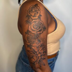 Lindsay Philomene Instagram - ✨ My client had an old rose tattoo on her arm (not done by me) I reworked it   added more flowers through 2 appointments ✨ thankyou Éloïse ✨💕
.
.
.
(Swipe to see old tattoo)
.
.
.
To book a custom or flash : Linktree in bio ✨ or email phylotattoos@gmail.com
.
.
.
#armtattoo #tattoosleeve #melaninpoppin #montrealtattooartist #floraltattoo