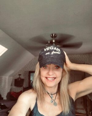 Linnea Quigley Instagram - The hat says it all! #veganasfuck #veganasf