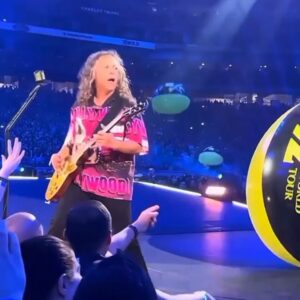 Linnea Quigley Instagram - @kirkhammett from my favorite band @metallica wearing a Hollywood Chainsaw Hookers shirt last night at Cardinals stadium! I’m sure honored, I love them! Fun fact: I was almost in a Metallica music video for the song ‘Turn the Page’! It was between @gingerlynnallen and I. At least someone nice got it!