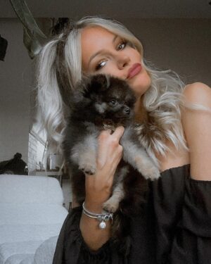 Lisa Massé Instagram - M Y  F A M I L I A R
🔮

The witch has her little fur ball. My little boy 🖤 

#pomeranian #puppy #love #happy #cute #witch #blonde #funny #photoshoot #play #black