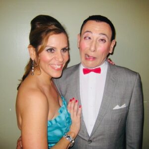 Lori Alan Instagram - I am devastated💔
I am so grateful I was allowed to watch Pee-wee when I was little, and then to work with him as an adult. 
He was hilarious, his real speaking voice was so sexy and fabulous, he would always check on me and leave me the most ridiculously inappropriate & beautiful voicemails for my birthday, he made you feel like you were the only person in the world and shared and thanked people so often and graciously.
I truly believe he allowed so many people, young, and old, to be exactly who they are, and ignite so much of our own imaginations. Our world is truly Technicolor, because of his artistry and imagination. 
I am so grateful to have met, and worked with the most amazing icons, and the additional newer cast members when we did the revival of his stage show at Club Nokia in Los Angeles.
he did a Q&A after every single show! 
He loved his fans, his friends, so deeply, always asked about my mom, my dogs and told me I could call him anytime about anything. 
Bless his heart, he would make a phone call to anybody to cheer them up and I’m borrowing his laugh right now to soothe my soul.
thank you for changing my life. Oh… I’ll never forget my audition to do all the female voices and
 understudy the ONE AND ONLY, Lynne Marie Stewart. A.k.a. Miss Yvonne. 
I was in full, crazy wardrobe, and I came twirling into the room, and he just laughed and said, “Hello Miss Yvonne’s understudy! You look beautiful today I will be reading with you“ got up, hugged me laughed told me I was beautiful and funny, and he wished me all the best in case I didn’t get cast. What a Mench. Please note in this post where he would like donations to be made. It’s important that we do that for all he did for us. 
#RIP in laughter, love and light 💔🤍💔🤍
 Your joy, sensitivity, indescribable talent, iconic presence on the WORLD will be surely missed, but never forgotten. 
forever and always, Chairy 🩵

@su2c  @alzassociation DONATE🙏🏼
#PaulReubens #PeeweeForever 

@phillamarr @keythefarley