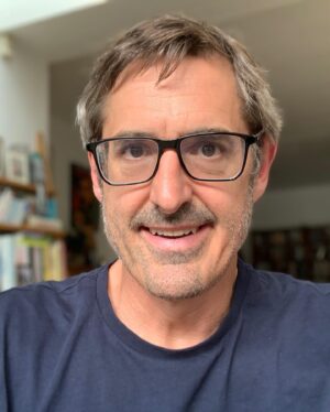 Louis Theroux Instagram - So this is what my beard grows like now due to what I think is probably alopecia. Basically I get a little triangle of stubble around my mouth and some more at the sides. It’s not a big deal, but I don’t want people to think I’m doing something creative with my facial hair and doing it badly, when it’s just what I look like when I don’t shave. This is also why I don’t wear a beard as much anymore. Maybe it’ll grow back. Who knows? It mainly happened over the course of 2022. You get a sense of how it progressed from the other two photos taken six months before and a year before.
