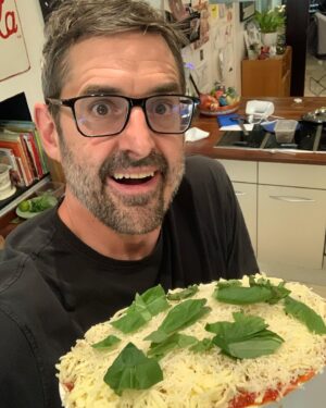Louis Theroux Instagram - So this is what my beard grows like now due to what I think is probably alopecia. Basically I get a little triangle of stubble around my mouth and some more at the sides. It’s not a big deal, but I don’t want people to think I’m doing something creative with my facial hair and doing it badly, when it’s just what I look like when I don’t shave. This is also why I don’t wear a beard as much anymore. Maybe it’ll grow back. Who knows? It mainly happened over the course of 2022. You get a sense of how it progressed from the other two photos taken six months before and a year before.