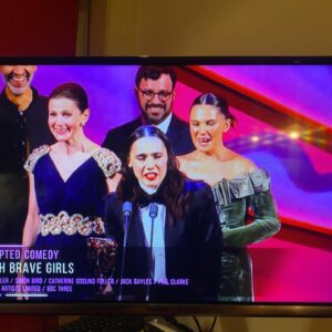 Louise Brealey Instagram - Well that was BATS. I’ve been on a plane all day and the sun has just gone down over the Hudson. 

Last night our little comedy won the biggest prize in the land that a little comedy can win - the Best Scripted Comedy BAFTA. We were all high as herrings on pure shock and joy. And as you can see I was grinning maniacally on stage! 

Thank you to everyone who worked on this show - you are ALL absolute legends. 

#suchbravegirls