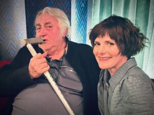 Louise Brealey Instagram - Dad and his friend Nigel came to our London screening of Chuck Chuck Baby on Saturday night. He put his hand on my arm at the end and said Well done, girl. Here he is eating a pie and using his walking stick as a microphone in the bar of the beautiful @thegardencinema in Covent Garden. #indiefilm #chuckchuckbaby #daddio