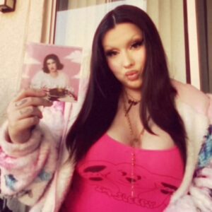 Lucy Loone Instagram - hiiiiieeee 💗🍪👩🏻‍🍳 here’s me very shiddily showing off the “Eat it Up:Head Chef Edition (Deluxe)” CD artwork ❤️‍🔥 hope you’ve been enjoying the record, tysm for listening! <33,  𝓛