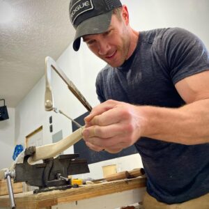 Luke Macfarlane Instagram - On my cross country trip I spent 3 days with the talented and soulful @organic.archer  Woodworker, Artist and bow hunter. Over the course of three days he showed me how to built a traditional American long bow. Shaping a rough hackberry timber, into this.  An excellent teacher, I look forward to refining my skills and building my next bow. Who wants me on their zombie team ?