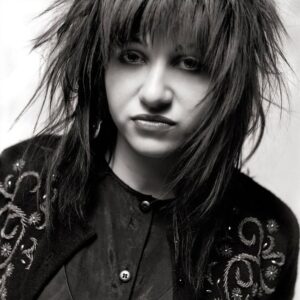 Lydia Lunch Instagram - Lydia Lunch 
Photos by: @rickmcginnis 1988 in Toronto 

“Lydia Lunch showed up performing the material she’d later release on her Oral Fixation record, a pioneer of the spoken word genre (along with former Black Flag singer Henry Rollins - more about him shortly) that would turn out to have real longevity. My photos of her were meant to accompany an article my friend Tim was writing - a paean to the woman who was a kind of nihilist sex symbol in the underground subcultures that had formed since punk rock. So I tried to approach the shoot as something like glamour photography, not dissimilar to the photos I’d take of actress (and onetime Bond Girl) Jane Seymour for a fashion magazine a couple of weeks later.
Bringing along my little portable studio - a light stand and umbrella bounce, a portable flash and a big white painter’s tarp I carried around in a gym bag - I cleared a space in the storage room at the Silver Dollar and found an unbroken bar stool that I placed midway between my tarp backdrop and my flash.” - Rick McGinnis 

#lydialunch #rickmcginnis