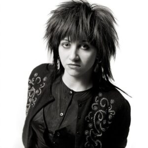 Lydia Lunch Instagram - Lydia Lunch 
Photos by: @rickmcginnis 1988 in Toronto 

“Lydia Lunch showed up performing the material she’d later release on her Oral Fixation record, a pioneer of the spoken word genre (along with former Black Flag singer Henry Rollins - more about him shortly) that would turn out to have real longevity. My photos of her were meant to accompany an article my friend Tim was writing - a paean to the woman who was a kind of nihilist sex symbol in the underground subcultures that had formed since punk rock. So I tried to approach the shoot as something like glamour photography, not dissimilar to the photos I’d take of actress (and onetime Bond Girl) Jane Seymour for a fashion magazine a couple of weeks later.
Bringing along my little portable studio - a light stand and umbrella bounce, a portable flash and a big white painter’s tarp I carried around in a gym bag - I cleared a space in the storage room at the Silver Dollar and found an unbroken bar stool that I placed midway between my tarp backdrop and my flash.” - Rick McGinnis 

#lydialunch #rickmcginnis