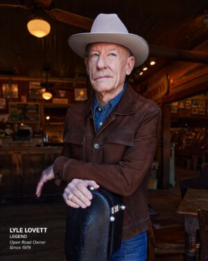 Lyle Lovett Instagram - Legendary musician and actor Lyle Lovett wears his own personal Pure Open Road in Alabaster. Shot on location at the iconic @gruenehall in Gruene, Texas, where Lovett played some of his earliest gigs as a musician. 
 
Over a career that spans more than four decades, @lyle_lovett solidified his status as one of country music’s most iconic and iconoclastic voices, crafting songs that defy categorization, borrowing from jazz, gospel, Texas swing, and the blues to create a hybrid sound that’s all his own. A born-and-bred Texan who grew up outside Houston in the town of Klein, Lovett combines a veneration for tradition with a healthy sense of irreverence, as witnessed by his playful and often mischievous lyrics. It all comes from an authentic place, he says: “I write about things that feel real to me, things that really happened, things I really see. I don’t have to write songs. I just have to write them down.”
 
Those songs have taken Lovett from the Grammys to Hollywood, including memorable turns in four Robert Altman films. While he’s been known to wear a Prada suit with his Stetson and custom-made cowboy boots, he’s also a longtime rancher and rider (with the scars to prove it) and remains a true Texas gentleman to his core, with an ever-expanding personal collection of Stetson Open Roads. His first was inherited from his grandfather in 1979. His most recent? The Limited Edition 20X in Butterscotch that he picked up just last fall. “My grandfather always wore an Open Road to church,” Lovett says. “So to me, the Open Road was always the dress version of a cowboy hat. It has a cattleman’s crease in the crown and a conservative brim, so you’re not showing off.” 
 
#OpenRoadCharacterDriven
#ItsAStetson

📷: @stevenvisneauphotography