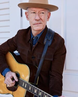 Lyle Lovett Instagram - Legendary musician and actor Lyle Lovett wears his own personal Pure Open Road in Alabaster. Shot on location at the iconic @gruenehall in Gruene, Texas, where Lovett played some of his earliest gigs as a musician. 
 
Over a career that spans more than four decades, @lyle_lovett solidified his status as one of country music’s most iconic and iconoclastic voices, crafting songs that defy categorization, borrowing from jazz, gospel, Texas swing, and the blues to create a hybrid sound that’s all his own. A born-and-bred Texan who grew up outside Houston in the town of Klein, Lovett combines a veneration for tradition with a healthy sense of irreverence, as witnessed by his playful and often mischievous lyrics. It all comes from an authentic place, he says: “I write about things that feel real to me, things that really happened, things I really see. I don’t have to write songs. I just have to write them down.”
 
Those songs have taken Lovett from the Grammys to Hollywood, including memorable turns in four Robert Altman films. While he’s been known to wear a Prada suit with his Stetson and custom-made cowboy boots, he’s also a longtime rancher and rider (with the scars to prove it) and remains a true Texas gentleman to his core, with an ever-expanding personal collection of Stetson Open Roads. His first was inherited from his grandfather in 1979. His most recent? The Limited Edition 20X in Butterscotch that he picked up just last fall. “My grandfather always wore an Open Road to church,” Lovett says. “So to me, the Open Road was always the dress version of a cowboy hat. It has a cattleman’s crease in the crown and a conservative brim, so you’re not showing off.” 
 
#OpenRoadCharacterDriven
#ItsAStetson

📷: @stevenvisneauphotography