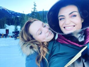 Lyne Renee Instagram - You’ve all been asking for a selfie with Jess from this season. Well, with the airing of episode 8 TODAY I’m finally able to share them! What a day that was! Such respect for crew and all who are there hours before and after us in freezing temps. I never once complained that day or mentioned cold in honor of them. We were very  lucky to have the sun that day but still. It was -14 C that beautiful early morning! #luckygirl #preparation #new #streaming #hulu  @jessicalaurasutton @motherlandtv @freeform #motherlandfortsalem