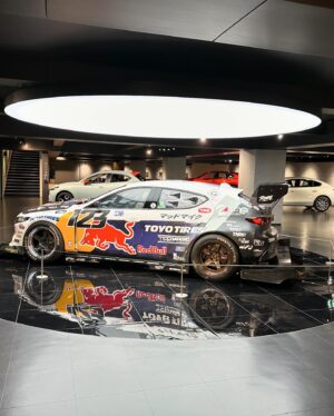 Mad Mike Instagram - Please come and see @pikespeakhillclimb fighter Bullet Mazda3 fastback 4rotor twin turbo RWD car in @mazda_jp HQ museum. 
It’s displaying until and of the July 👍. 
Please enjoy 😉. 

パイクスピークカーのマツダ3ファストバック、ブルレット4ローターツインターボ車はマツダ本社ミュージアムにて展示しております。
リアルなレーシングカーを間近で是非見てください。
ご来館には事前予約が必要となります。
https://www.mazda.com/ja/about/museum/

Never stop challenging 🤘. 
Mazda sprit racing. 
@madmike.123 
@teamtoyotiresjp 
@toyotires 
@redbulljapan 
@redbullnz 
@mazda_jp 
@mazdausa 
@haltechecu 
@rayswheels_official 
@radiumengineering 
@exedy_racing_clutch 
@turbosmarthq 
@garrettmotion 
@holinger_engineering 
@driveshaftshop 
@tone_japan 
@motys_tribojapan 
@bride_japan 
@fujiwpc 
@alexandre.tanaka.94 
@mzracingjp 
@response_jp 
@plazmamanracing 
@injectordynamics 
@trakyoto 
@ptpturboblankets 
@odula_japan 
@endlessjapan 
@kw_suspension_jp 
@pwradvancedcoolingtechnology 
@t.yukutake.candc.jlead 
@stackedracing_inc 
ATS LSD 

#tcpmagic #neverstopchallenging #madmike #4rotor #bullet #mazda #mazda3 #toyotires #proxes #redbull #レッドブル #mapr  #madeinjapan #mazdaspritracing #tonetool #rayswheels #motysoil #kwsuspension #haltechecu #pwrradiators #turbosmart #endlessdrake #radiumengineering #holingerengineering #exedyclutch #injectordynamics #driveshaftshop #atslad