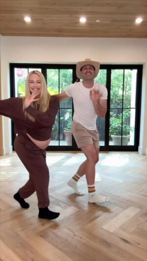 Maksim Chmerkovskiy Instagram - We are bumpin along at 7 months! 🐣😝🩵 Third baby boy coming SO SOON! 

Let’s Easy Salsa This Thursday Morning 💃🏼💃🏼💃🏼

#salsadancing #salsa #couplevideos #couplelove #dancers #7monthspregnant #pregnant #preggo @hernandeztatan30