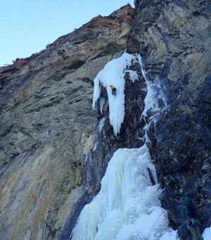 Marc-André Leclerc Instagram - Here’s a shot @bretteharrington captured of the direct first pitch of The Theft.  I had wondered about climbing the dagger directly (as opposed to climbing the thin smears over right) but assumed it might require bolts. As I started up I began to spot more than ample rock protection and soon found myself chimneying up between the rock and the ice. Higher up the fun began, as the clearly detached dagger made spooky noises as I tapped and hooked my way up it, getting further and further from my last bird beak in the rock. Everything held together but my heart skipped a beat each time the dagger made a loud booming crack releasing tension from inside. #spicytimes