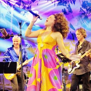 Marcy Harriell Instagram - handmade disco dress #1 from last week! 6 yards of wax print, 103 degrees of heat❤️‍🔥

📸 pics by my loves @mrnycom who always make me blush

💃🏽fabric from my sis @houseofmamiwata who always makes me faint

#waxprintfabric #instasew #imademyclothes
#HOORAYFORPHOTOS

………Repost @mrnycom
Nothing less than a force of nature,
the incandescent Marcy Harriell,
appearing with Joe McGinty & The Losers Lounge,
infused the crowd with collective joy,
reminding us all to face the music and dance.
#disco #collectivejoy #NYC #losersloungenyc #loserslounge #lincolncenter #summerforthecity #thebespokebelter @marcyharriell @thelosersloungenyc @lincolncenter