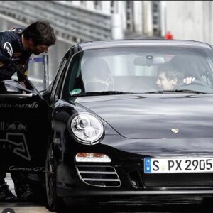 Mark Webber Instagram - What have we got here?? Seb and I working at @redbullring back in the day doing high speed taxi laps with guests of @redbull. At the end of the day we even drove each other for a few laps. That’s the biggest bloody endorsement a street car can have, F1 drivers wanting to do more laps for the own pleasure😉👌🏽#porsche #911