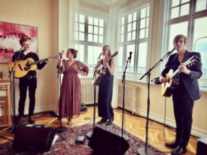 Markéta Irglová Instagram - In the historic building Höfði in Reykjavík I got to perform with my friends on John Lennon’s birthday, October 9th, during the annual ritual of turning on the Peace Tower of Light created by @yokoono 

Höfði is a bulding of historic significance because it is where Reagan and Gorbachev met to discuss reaching a peaceful resolution and bringing an end to the Cold War. 

The irony of that can not be lost on one during these times. History is on repeat and it shall be so until we either evolve or self-destruct. The choice rests with each and every one of us thought it may not always feel that way.

I pray for peace for all people everywhere, and I mourn the lives lost, just as I weep for the Earth who also feels the pain of all the destruction. Please God, may the horrors end, for the sake of us all and our future. 🙏🤍🕊️