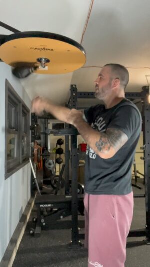 Matt Brown Instagram - Not a crazy hard day today but did a few exercises I do regularly to build ko power. I’ve been working on rebuilding my garage gym and it’s looking pretty solid now… anyway this was the workout:  warmup-3x5 rounds speed bag…. Rotations with @kynett_usa flywheel trainer (this one is amazing more videos coming soon)…. Homemade earthquake bar presses 4x25…. Kettlebell cleans 5x15 my form sucks haven’t done these in a while…. Isometric abs with punches 1 min hold 5 times…. Then 30 min in @redwoodoutdoorsco sauna at 170-180. @lambofgod rules too.