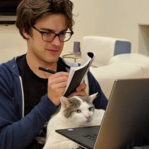 Matthew Patrick Instagram - Working on theories is a team effort. 
Skip and I busy watching The Aristocats for our upcoming Disney series on Film Theory. You can tell he was REALLY into it.

What's your favorite Disney movie? Emperor's New Groove was a solid contender for me after watching them all again.

#cats_of_instagram #workfromhome #writing #youtuber