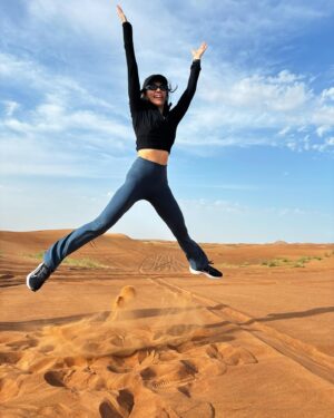 May Phua Instagram - Hot, arduous to walk on sand. Walked uphill to inhale the beauty of seeing the vastness of the desert.
And jumping up doesn’t make it easier, thank goodness the photographer wasn’t too bad😂.

#dubaidesert