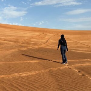 May Phua Instagram - Hot, arduous to walk on sand. Walked uphill to inhale the beauty of seeing the vastness of the desert.
And jumping up doesn’t make it easier, thank goodness the photographer wasn’t too bad😂.

#dubaidesert