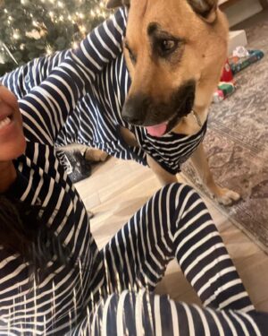 Meagan Holder Instagram - Sending love to you all and an apology to Parker for yet another year in matching pajamas ❤️🎄