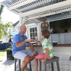 Meaghan B. Murphy Instagram - What I wish our Father’s Day looked like vs. reality. ⬅️ SWIPE ⬅️

We love you to Long Island and back in traffic, Patrick Murphy. 🧡 You are the ultimate lax 🥍 dad & co-captain in life. I know our own dads are proudly cheering us on from heaven 😇

📸 @johnherr 
🏊🏻‍♀️ Pool design @harmonydesigngroup 

#fathersday #dadsofinstagram #dadsday #lacrossedad #backyardgoals
