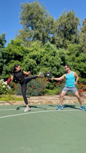 Megan Le Instagram - The basketball players hate it when we set up for a kicking day. Sorry, karate wins! 🏀 vs. 🥋 
#motivationmonday with @stuntpete 
.
.
.
#outdoorworkout #trainingpartner #martialarts #martialartist #tkd #taekwondo #karate #muaythai #kicking #fight #fighter #action #partnerdrills #kicks #spinningheelkick #cardio #legday #plyos
