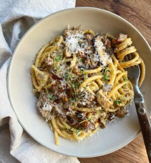 Megan Mitchell Instagram - Sunday dinner, my Creamy Mushroom and Sausage Pasta. Recipe👇🏼
⁣
Ingredients:⁣
• EVOO, for drizzling⁣
• 1.5 pounds sweet Italian turkey sausage (5 sausages removed from casings)⁣
• 1 pound thinly sliced cremini and/or shiitake mushrooms⁣
• Kosher salt, to taste⁣
• Freshly cracked black pepper, to taste⁣
• 1 tbsp. finely minced thyme⁣
• 1/2 tsp. red chili flakes⁣
• 8.8 ounces mascarpone cheese, room temperature⁣
• 1 cup freshly grated Parmesan cheese, plus more for garnish⁣
• 1 pound bucatini pasta⁣
⁣
Directions: ⁣
• Bring a large pot of water up to boil. Liberally season with salt⁣
• While the water comes up to boil, make the sauce. Bring a 14-inch, high sided skillet up to heat over medium. Drizzle in 1-2 tbsp. EVOO and add in the sausage, breaking into smaller pieces. Cook for 10-12 minutes or until golden brown and any liquid released has evaporated⁣
• Next add in the mushrooms and sauté for 10 minutes or until browned, stirring occasionally and adding more EVOO if the skillet looks too dry⁣
• Season with salt and pepper then add in the thyme and chili flakes. Stir together and cook for 1-2 minutes more⁣
• Turn the heat to low and add in the mascarpone and parmesan. Keep warm, stirring occasionally, while the pasta cooks⁣
• Add the pasta to the boiling water and cook per package directions until al dente⁣
• Add the pasta directly to the sausage and mushroom skillet along with 1 cup pasta cooking liquid⁣
• Turn the heat up to medium, stir together and simmer until thick and creamy, about 1 minute⁣
• Serve in shallow bowls with extra black pepper and parmesan cheese