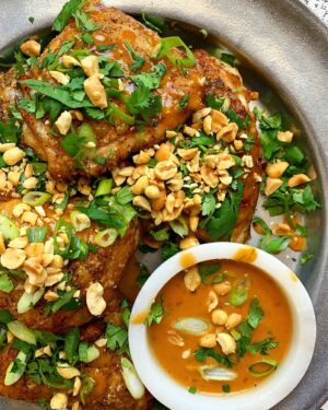 Megan Mitchell Instagram - Chicken Thighs with a Spicy Peanut Lime Sauce. When you want satay vibes but for a whole meal. Recipe is written for a grill or grill pan but you can easily bake this in the oven at 400F for 25-30 minutes or until cooked through and the skin is crispy. Recipe linked in bio