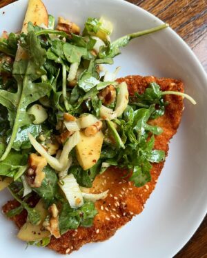 Megan Mitchell Instagram - For a good while I was making chicken cutlets every week. They’re quick and I love the combo of crispy chicken topped with a tangy, crunchy salad. This photo is a reminder to start making them again. Recipe linked in bio or write RECIPE in the comments and I’ll slide into your dms. Happy Sunday
