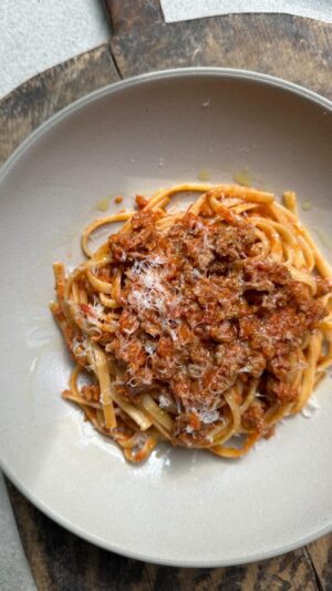 Megan Mitchell Instagram - This has been on heavy rotation in our house lately. Great way to use my favorite @calorganicfarms veggies. Recipe👇🏼⁣
⁣
Ground Turkey Bolognese: ⁣
• 5 Cal-O green onions, cut into 1-inch pieces⁣
• 4 Cal-O celery stalks, cut into 2-inch pieces⁣
• 3 Cal-O medium carrots, scrubbed cleaned and cut into 2-inch pieces⁣
• 3 garlic cloves⁣
• Extra virgin olive oil, for sautéing ⁣
• Kosher salt and freshly cracked black pepper, to taste⁣
• 1 pound ground dark meat organic turkey⁣
• 3/4 cup dry red wine⁣
• 1/2 cup heavy cream, preferably organic⁣
• 1/4 tsp. freshly grated nutmeg⁣
• 28-ounce can crushed tomatoes⁣
• 2 tbsp. tomato paste⁣
• 3 bay leaves⁣
⁣
Directions:⁣
• To a large food processor add the green onions, celery, carrots and garlic and pulse until it breaks down into small pieces but doesn’t puree into a sauce⁣
• Over medium high heat bring a medium sized Dutch oven up to heat. Pour in a few tablespoons of EVOO and add in the chopped vegetables. Season with salt and pepper and cook for 6-8 minutes or until they begin to soften and break down⁣
• Add in the ground turkey and break up into small pieces. Cook for 8-10 minutes or until cooked through⁣
• Turn the heat to medium and deglaze the pan with the red wine. Once absorbed, about 2-3 minutes, add in the cream and nutmeg. Stir and cook until the cream has almost fully absorbed⁣
• Turn the heat to low and add in the crushed tomatoes, tomato paste, bay leaves and a large pinch of salt and pepper⁣
• Stir, cover with the lid and simmer for 45 minutes then place the lid fully half on and cook for another 45 minutes, stirring often. Keep an eye on it so it doesn’t reduce too quickly and burn. It’ll go from a light creamy red to a deep, darker red⁣
• Once ready, remove the bay leaves and serve with pasta sprinkled with parmesan and a drizzle of EVOO. If the sauce has thickened too much add a little water to loosen⁣
