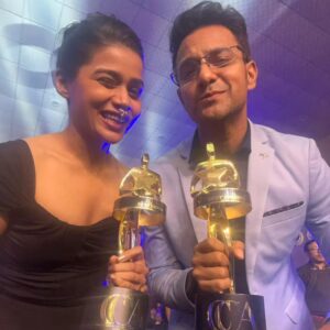 Megha Mathur Instagram - Joram swept awards for its writing bagged by @nakedindianfakir who brought all the attention to our table and nailed it there till the end with his impeccable speech and editing award by @avrobanerjee who didn't realise his award was being used to pose by a girl who was extremely happy for him. 🤩

What an absolute pleasure it was to be at the @filmcriticsguild Critic's Choice Awards with @smitatambe Tayee and @piyushputy who were on an outstanding list of nominations for best supporting actress and best cinematographer. Ardent supporters of Joram marking their presence at the ceremony were @ashimaavasthi @shariq_patel #PriyankaBanerjee and lucky me! ❤️

I was absolutely blown away by the striking subversion in the distribution of awards. It has made me optimistic of the new wave in Indian cinema. 
More power to all kinds of voices aching to be heard. ❤️

PS: @when_rajma_met_rice thanks for pushing me to get this picture, I didn't know an award would gleam up my face until I saw it myself. 🤭

#joram #bestwriting #bestediting #criticschoiceawards