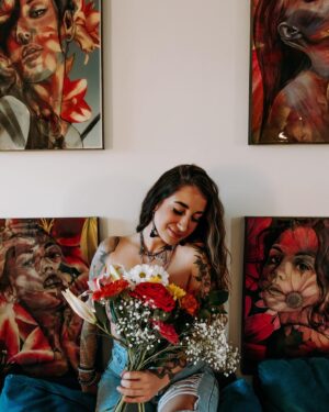 Melanie Posner Instagram - Miley Cyrus said “I can buy myself flowers,” and I took that very seriously. 

Ps) you can too, these paintings are available on my website 💐 Originals and prints ✨

📸 magic: @zena.negron.photography 
.
.
.
.
.
#portraitpainter #portraitpainting #flowerpaintings #mileycyrusflowers #oilpainter #womenwhopaint #sandiegoartist