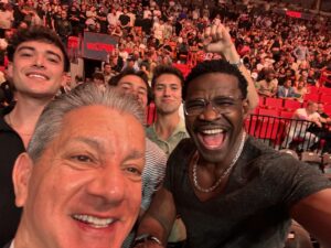 Michael Irvin Instagram - Me and my very great friend Mark Shapiro’s son Jack, and his friends Jimmy and Nick with the SUPER TALENTED BRUCE BUFFER, my other very great friend whom I love dearly. Having a beautiful time @UFC 299 here at home in Miami!!! We love you too Pam little (Mom of us all)