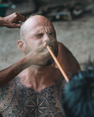 Mike Corey Instagram - FIGHTING SPIRITS WITH YANOMAMI SHAMANS
Every day at 3pm the Yanomami blow Yopo through bamboo into the noses of the shaman. This gray powder is composed of several seeds and leaves from the jungle which contain powerful hallucinogenic effects.

This allows the shaman to see spirits. 
This allows the shaman to fight spirits. 

The Yanomami believe that sickness is all in your mind, and you must battle daily against the bad spirits that try to infect your thoughts. 

I stepped in with the village elders and went to war with my own spirits. But I’ve got to ask my audience….

How much of our sickness is actually in our minds?
Drop your thoughts below.

If you want to visit Venezuela message @vidafuria 🇻🇪
Photos by @rodrigoungaro 📸

#venezuela #amazon #yanomami #tribe