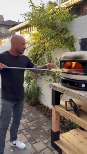 Mike Pyle Instagram - My pizza oven needed a new place to live that was sturdy and could withstand the elements. Linx pergola system brackets were the perfect product to get the job done. I used 4 Tri-fit brackets for the base and 4 L-fits for the sides. Then I just needed some 4x4” and 1x8” to build a beautiful outdoor pizza oven table🙌🏻 Follow along with this video to see how it all came together, and be sure to tag me in your next #DIY build. #MikePyleDesign #WildHogProducts #LinxPergolaSystem #PizzaOven #OutdoorKitchen