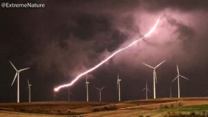 Mike Theiss Instagram - (Slideshow) Lightning strikes the blade of a large wind turbine at Smoky Hills wind farm in Ellsworth, Kansas with @reedtimmer @seanschofer1971. Photos shot by Mike Theiss @ExtremeNature using an @apple iPhone X.