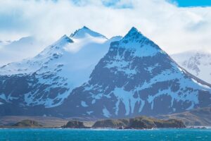 Mike Theiss Instagram - (On assignment with @LindbladExp) Incredible landscapes with snow capped mountains as we arrived to the main island of South Georgia and the South Sandwich Islands aboard the National Geographic Explorer. Photo by Mike Theiss @ExtremeNature