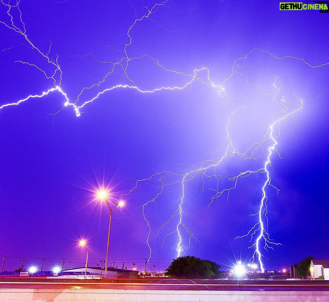 Mike Theiss - 7.7K Likes - Intense supercell thunderstorm with multiple lightning bolts striking the ground at the same time in Kansas after a long day of storm chasing. The sound was so loud it left my ears ringing for over an hour. Lightning is a massive electrostatic discharge between the electrically charged regions within clouds or between a cloud and the surface of the planet. The charged regions within the atmosphere temporarily equalize themselves through a lightning flash, referred to as a "strike" if it hits an object on the ground. TAG someone you want to go storm chasing with. Photo by Mike Theiss @ExtremeNature