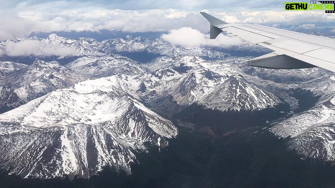 Mike Theiss - 5K Likes - Incredible view of snow capped mountains while flying into Ushuaia, Argentina getting ready to board the National Geographic Explorer to start a 2 week journey to South Georgia and the Falkland Islands (Islas Malvinas) with @LindbladExp. Photo by Mike Theiss @ExtremeNature