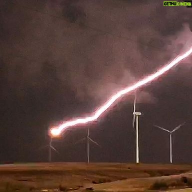 Mike Theiss - 8.6K Likes - (Slideshow) Lightning strikes the blade of a large wind turbine at Smoky Hills wind farm in Ellsworth, Kansas with @reedtimmer @seanschofer1971. Photos shot by Mike Theiss @ExtremeNature using an @apple iPhone X.