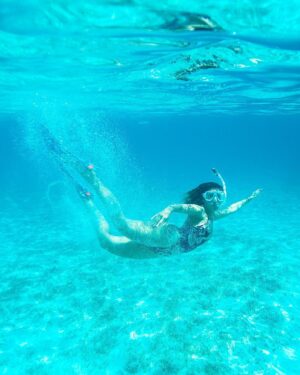 Mike Theiss Instagram - (On assignment @SandalsResorts) Snorkeling in crystal clear #BahamaBlue water with my talented and adventurous wife in Exuma, Bahamas. TAG someone you want to explore the Bahamas with. #LiveFunner Photo by Mike Theiss @ExtremeNature