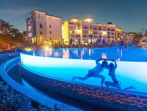 Mike Theiss Instagram - Relaxing and having a romantic evening swim at the @sandalsresorts infinity pool. Photo by Mike Theiss. #SandalsRoyalBarbados