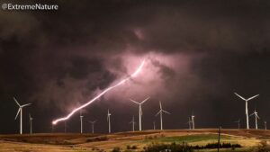 Mike Theiss Instagram - (Slideshow) Lightning strikes the blade of a large wind turbine at Smoky Hills wind farm in Ellsworth, Kansas with @reedtimmer @seanschofer1971. Photos shot by Mike Theiss @ExtremeNature using an @apple iPhone X.